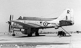 C Flight of 849 Squadron was operating this AEW.3, XP199 '431', from HMS Ark Royal when it was photographed at RAF Khormaksar in 1963. A visiting Canberra can be seen taxiing-out behind the Gannet's neatly aligned propellers.
