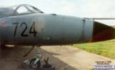 T.8M XL603 at Bruntingthorpe. A T.8 modified with a Sea Harrier nose and appropriate changes in the cockpit - the Hunter seems to have a habit of pretending to be other aircraft! The various bits sticking out of the nose are only seen on T.8Ms (and SHARs!). The brighter circle by the '4' is sun glare, not part of the paint scheme.