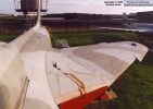 Looking back over the upper decking and port wing. As you can see, this time the canopy is pulled right back and fills the rail groove completely. The intake edges look natural metal, actually it's dirty white. The intake lips are neoprene and are white when new.