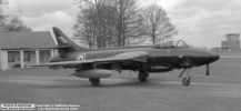 Former 'Black Arrows' Hunter F6, XF430, is seen outside one of the 5 MU storage hangars at RAF Kemble in the spring of 1962. Two years later it was converted to FGA9 standard and re-issued to the RAF. In 1977 it was again  modified this time as an FGA70A and sold to the Lebanese Air Force as 'L283'.