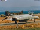 RAF Akrotiri, and F-4J(UK) ZE353 taxis out while an Omani Jaguar skulks in the background.