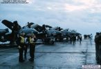 The final cruise. 899 NAS prepare to disembark; assorted shark mouth schemes plus the disgraceful 'flower power' decoration given to poor old '136' (even the code has been repainted in pink!).