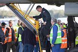 Test pilot Al McDicken deplaning